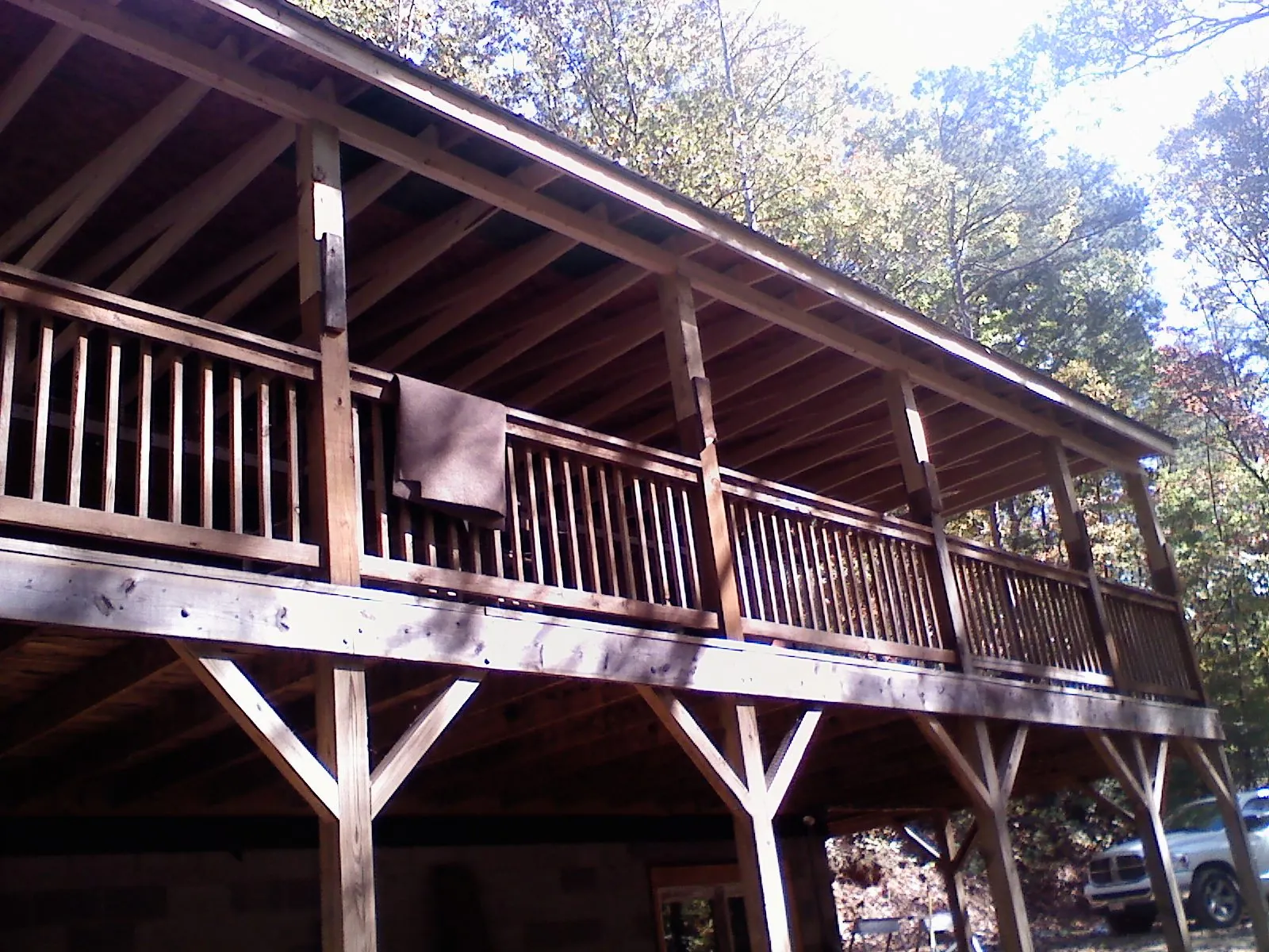 Timber framing under a new elevated porch and deck — Roof Leak Repair in Krum by Roofing Brothers